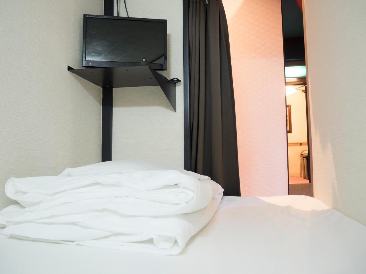 Capsule Hotel Hatagoya Токио Экстерьер фото